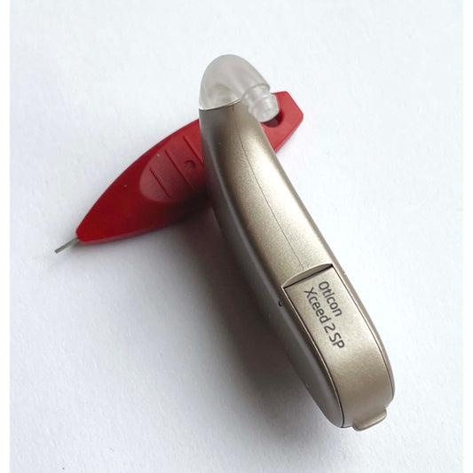 Used, Xceed 2 SP behind the ear/ Severe to Profound Beige Color